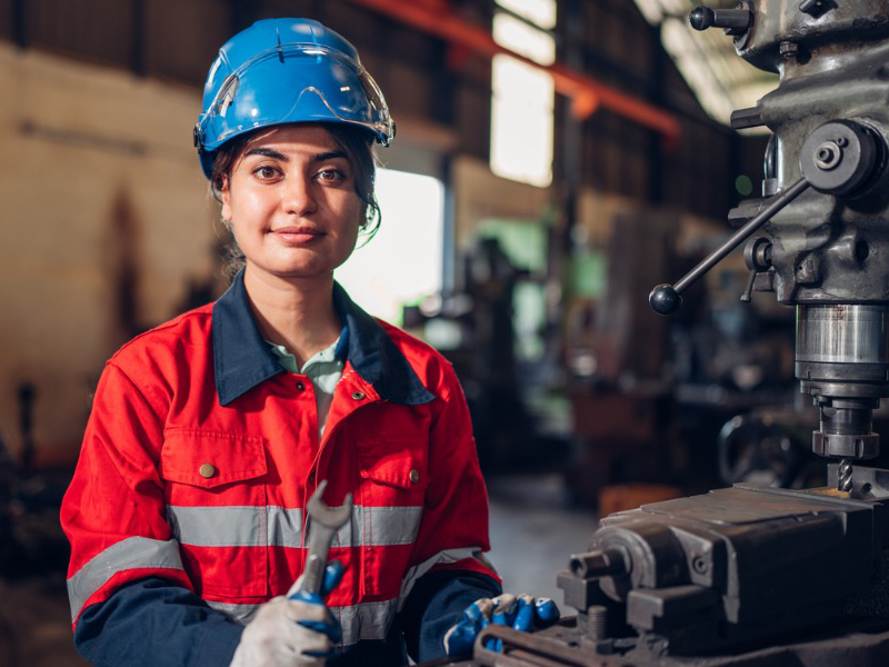 Operator running custom manufacturing software on the production line