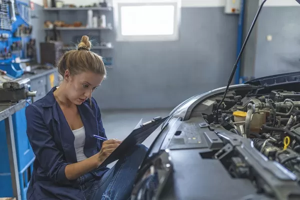 Engineer studying erp software reviews on a tablet
