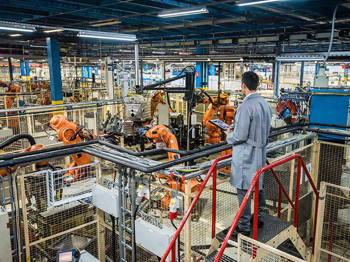 Inspector reviews defects flagged in quality management software